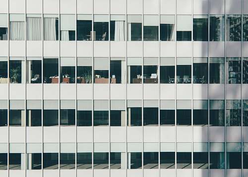 building white concrete building windows