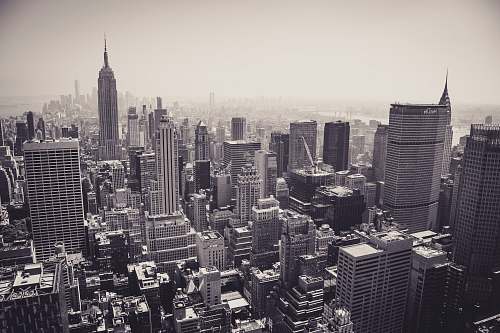 nature grayscale photography of buildings landscape
