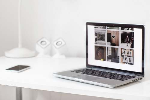 laptop turned on MacBook Pro on table computer
