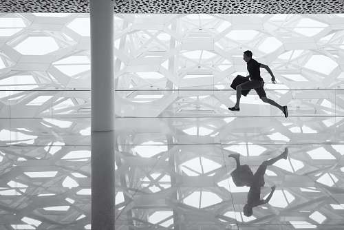 building man holding handbag late