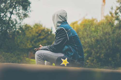 person person sitting on floor outdoor human