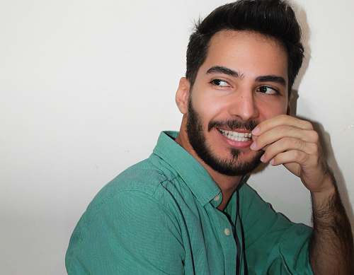 human man in a green dress shirt face