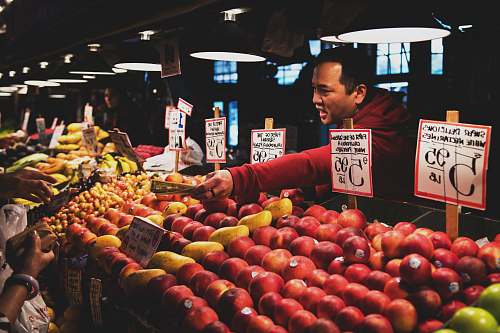 produce man selling fruits food