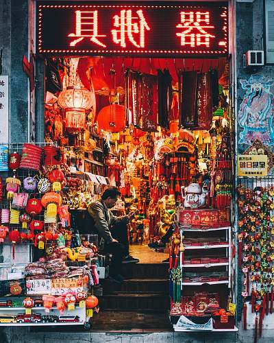 human man sitting inside store china