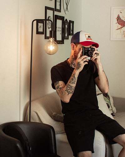 human man taking photo indoor skin