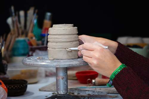 human person carving pot plaza pintor eugenio chicano