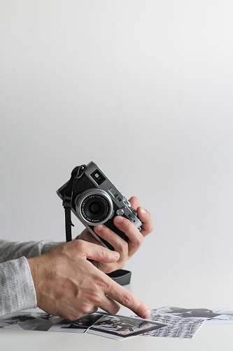 human person holding camera people