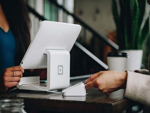 human white monitor on desk chip reader