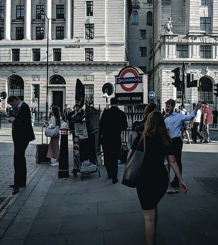 pedestrian woman in black at a sidewalk human