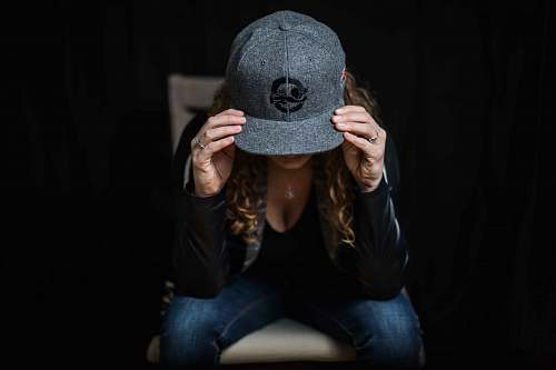 apparel woman wearing gray cap clothing