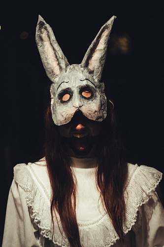 clothing woman wearing gray rabbit mask apparel