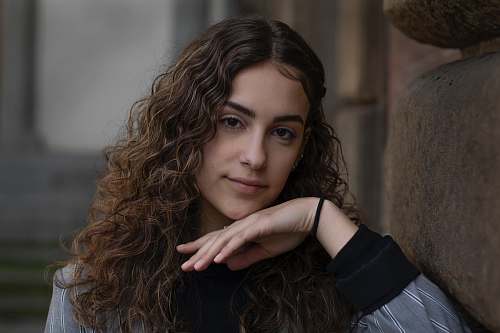 human woman with curly hair florence