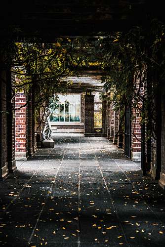 patio brown brick hallway corridor