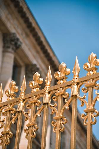banister brass-colored fence handrail