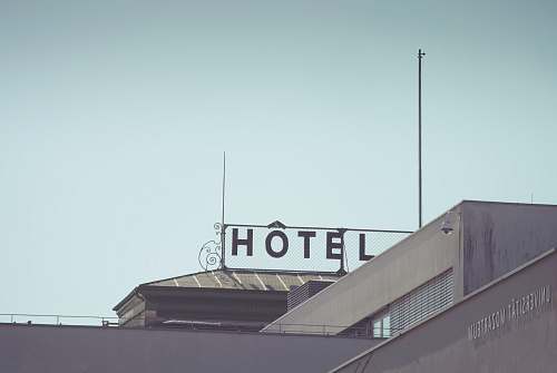 austria gray concrete building under gray sky sign
