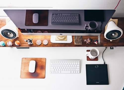 office turned of monitor near keyboard and mouse workspace