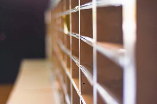 banister selective-focus photography of beige shelf handrail