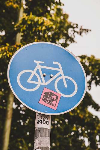 blue bike lane signage road sign