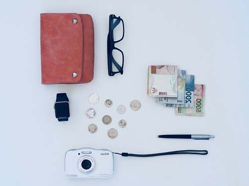 purse camera, pen, eyeglasses, watch, coin, and banknote coffs harbour