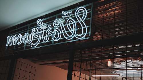 neon The Workroom shop signage sign