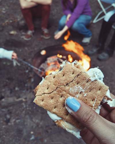  woman holding biscuit 