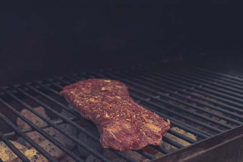 food grilled meat on charcoal grill barbecue