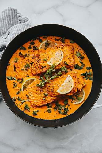 meal bowl of meat with sauce dish