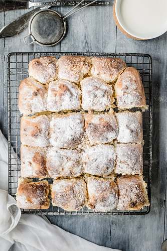 food baked bread on gray mesh baking tray flatlay