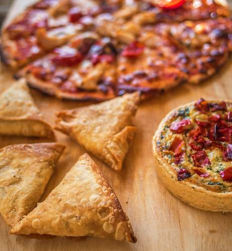 food sliced pizza near pastries pizza