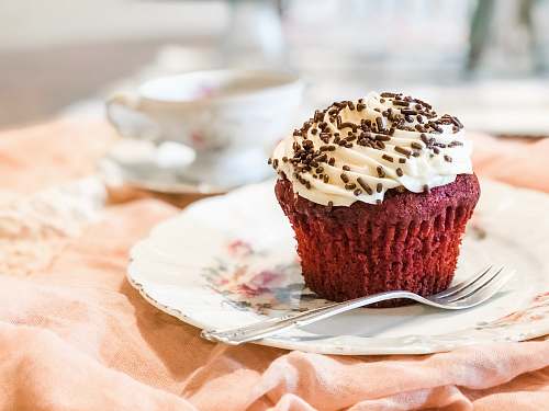 cream chocolate cupcake with toppings creme