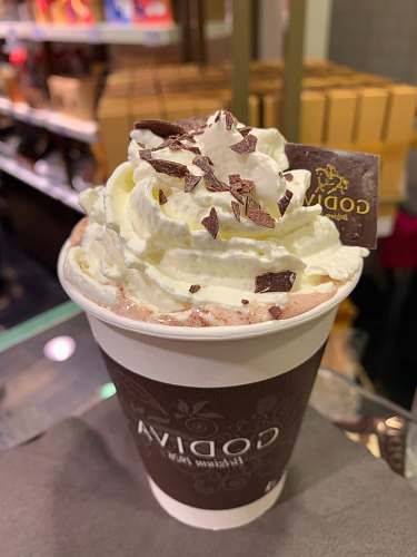 cream Godiva ice cream in cup creme