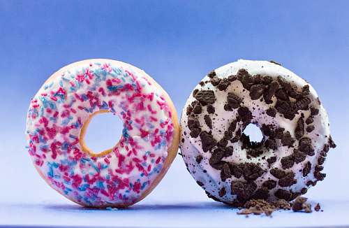 food shallow focus photo of two donuts donut