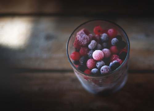 fruit assorted berries on highball glass grapes