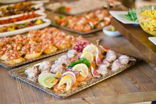meal assorted foods on tray on wooden surface restaurant