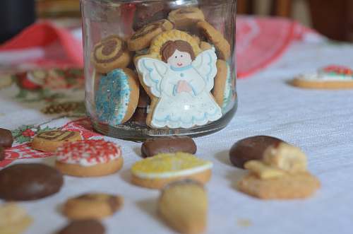 sweets assorted pastries beside glass jar confectionery