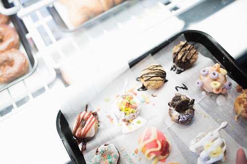 baking assorted pastries on tray donut