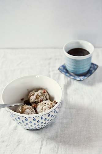 dessert baked pastries in white and blue ceramic bowl ice cream