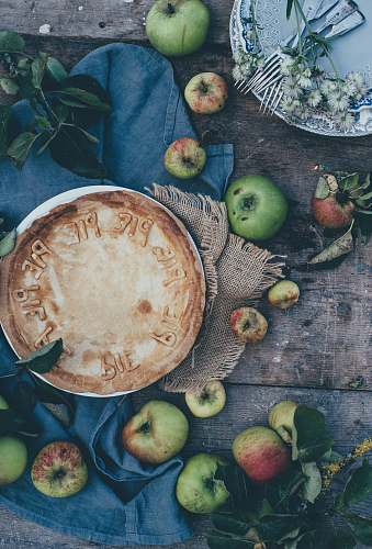 apple baked pie beside green apples apples