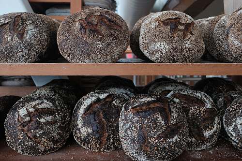 bread black pastries in shelf bun