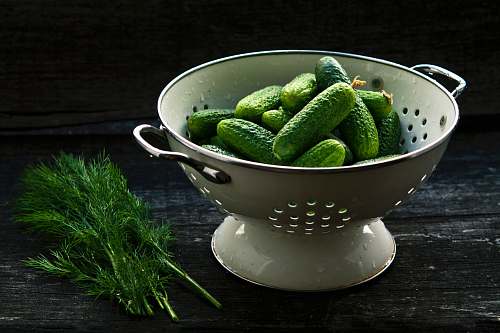 vegetable bowl strainer and pickles cucumber