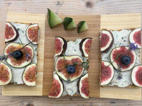 slices brown wooden chopping board snack