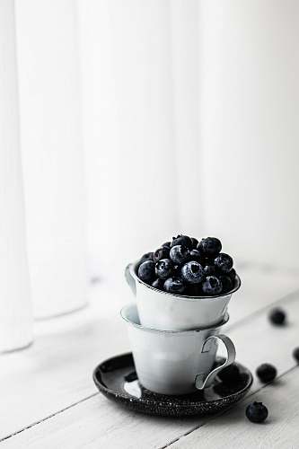 fruit bucket of black berries blueberry