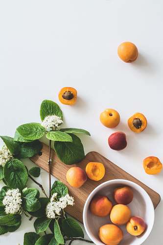 plant bunch of peach on white surface fruit