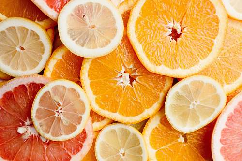 fruit bunch of sliced citric fruits grapefruit