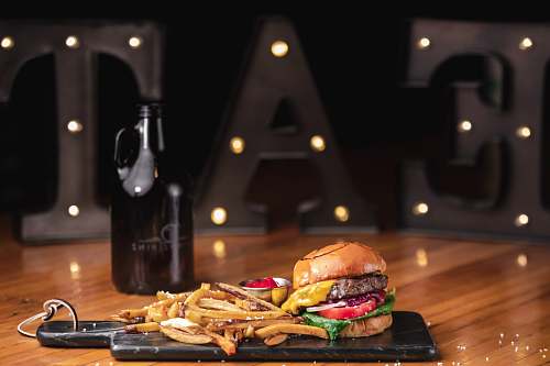 burger burger and fries on board fries