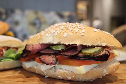 burger burger on brown chopping board brown