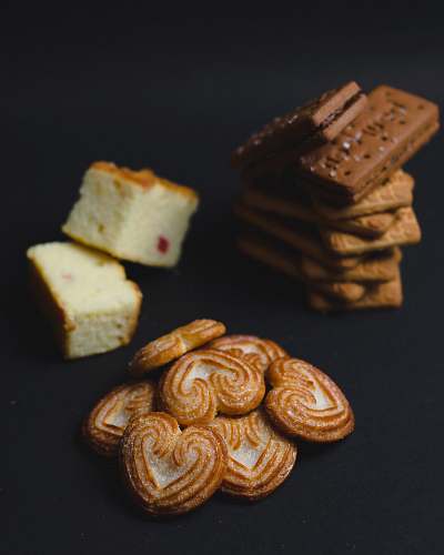 bread chocolate cookies and sliced mini cakes confectionery