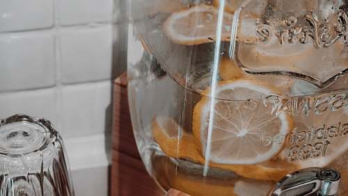 fruit citrus juice on clear glass container citrus fruit