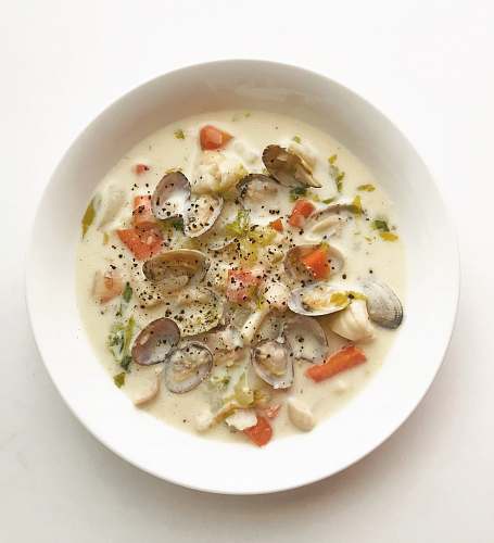 bowl clam and vegetable soup in white ceramic bowl dish