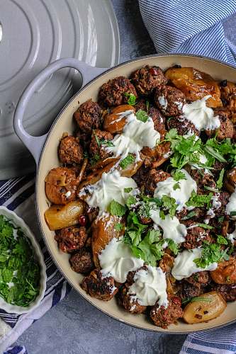 meal cooked food on gray frying pan bowl